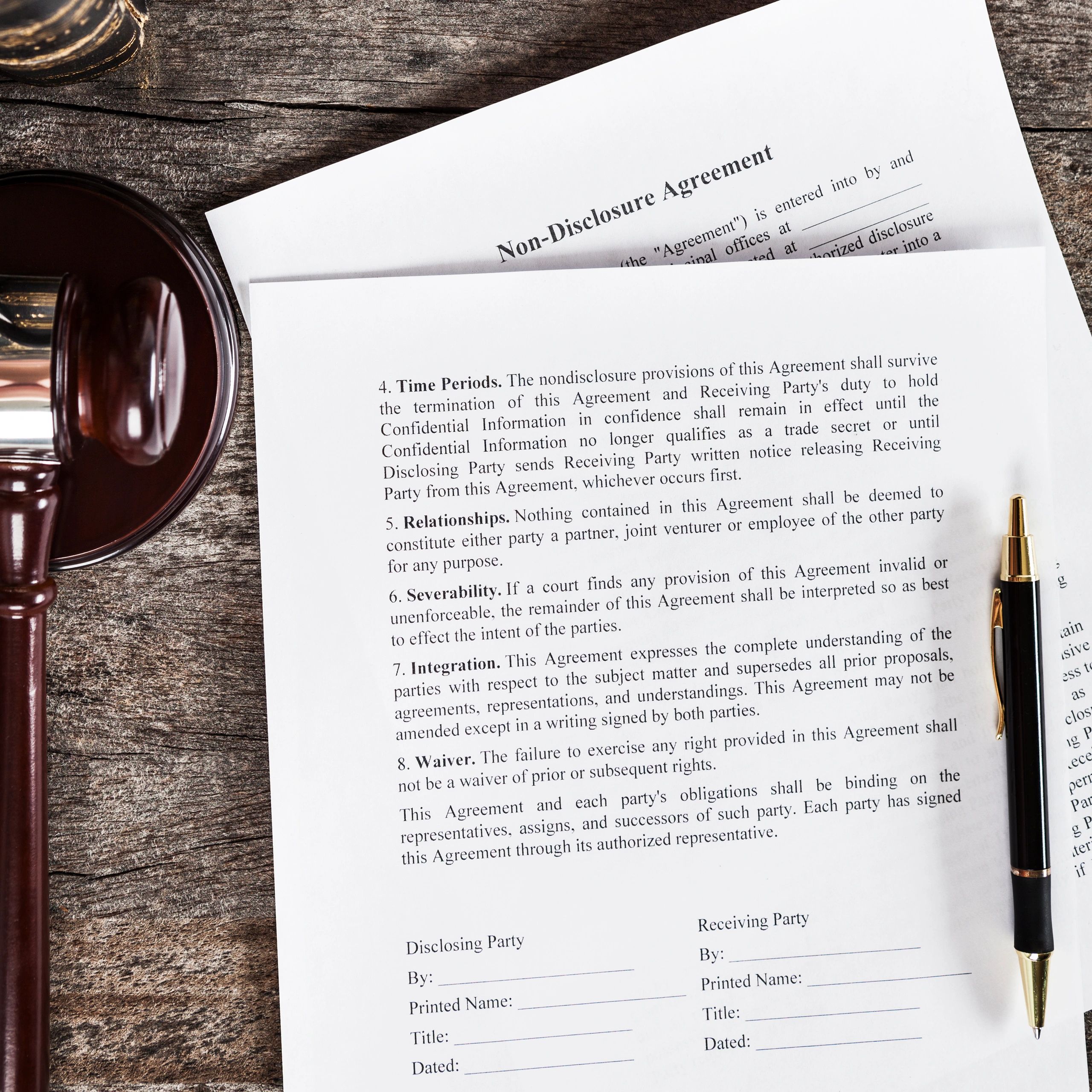 Legal documents, law books, and a gavel